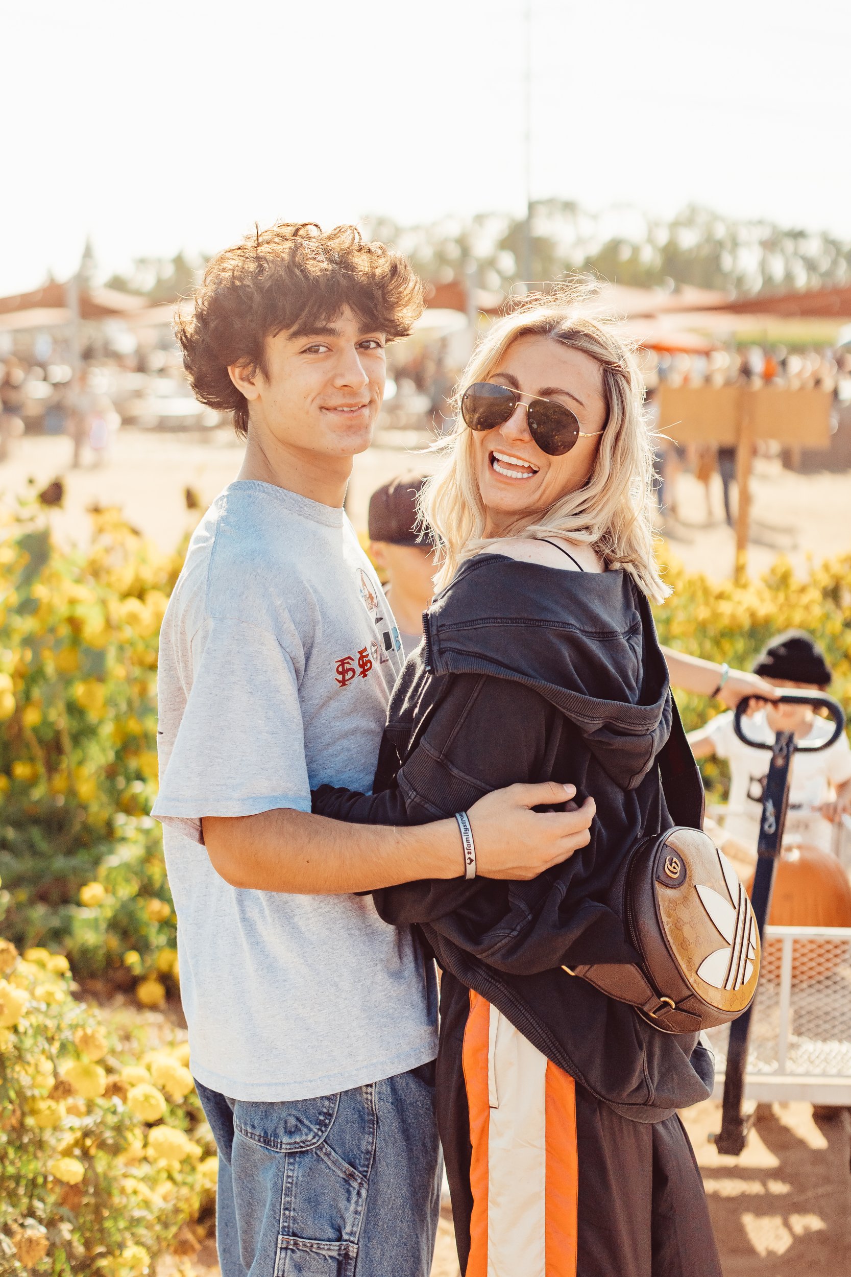 mom and son hugging