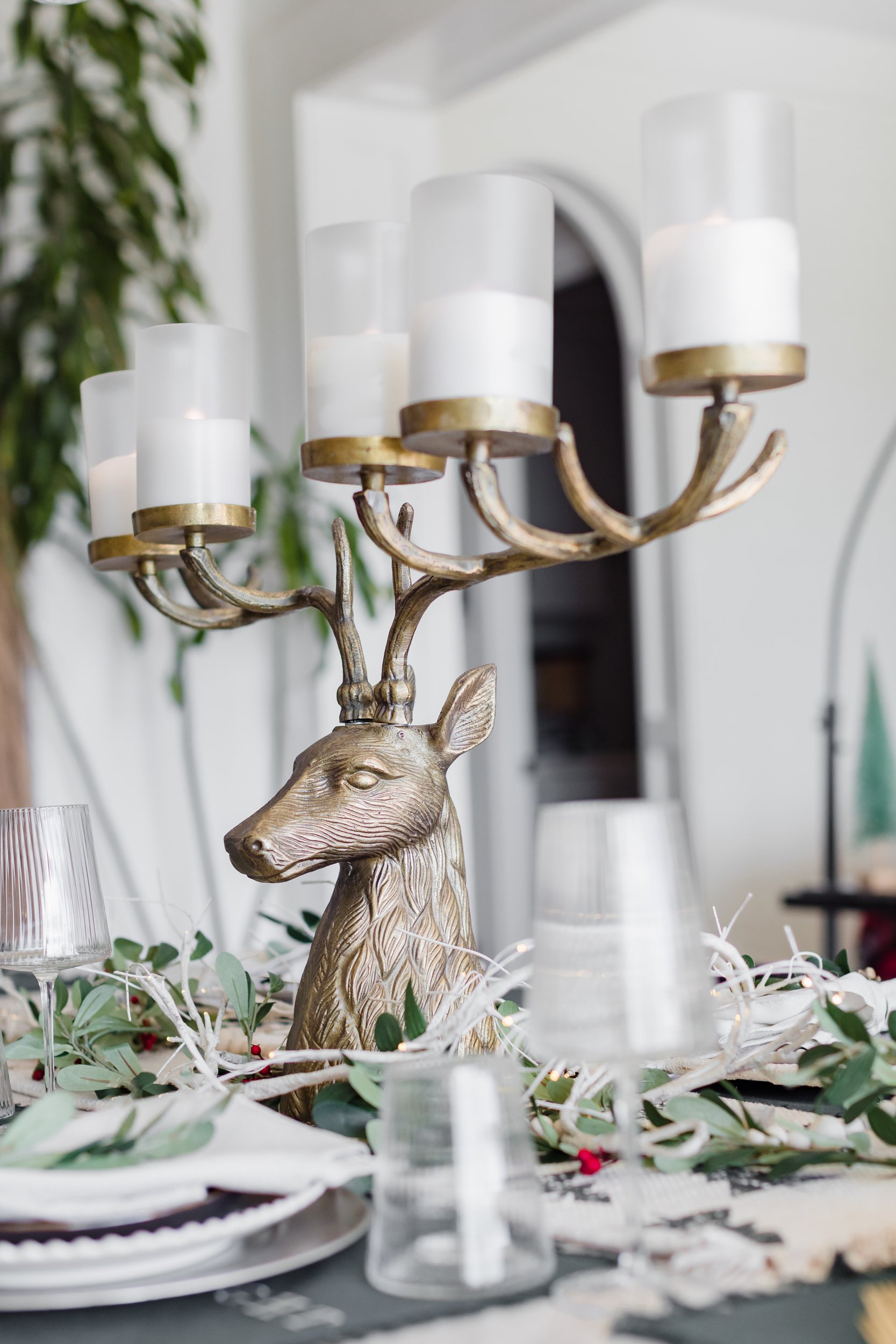 giant candle holder on dining table