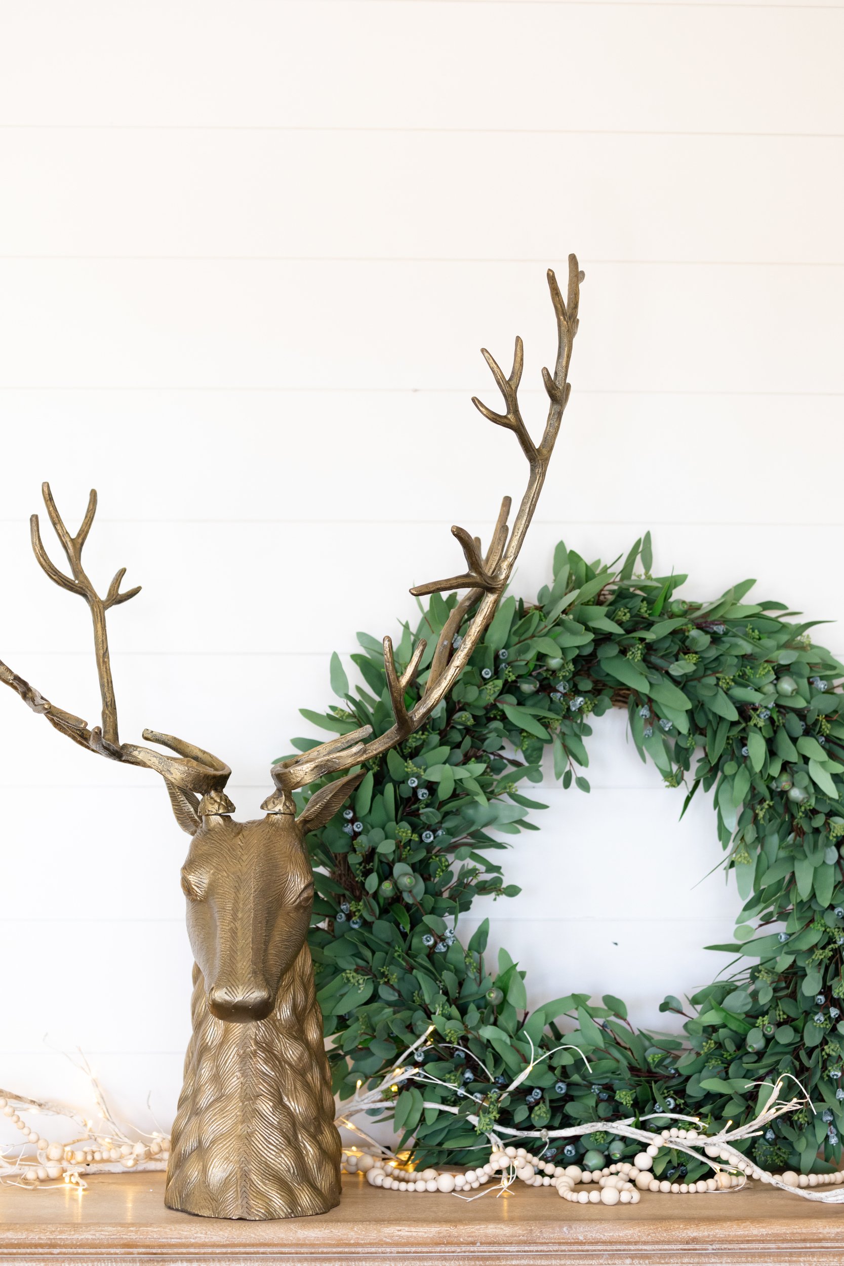 bronze staghead and wreath