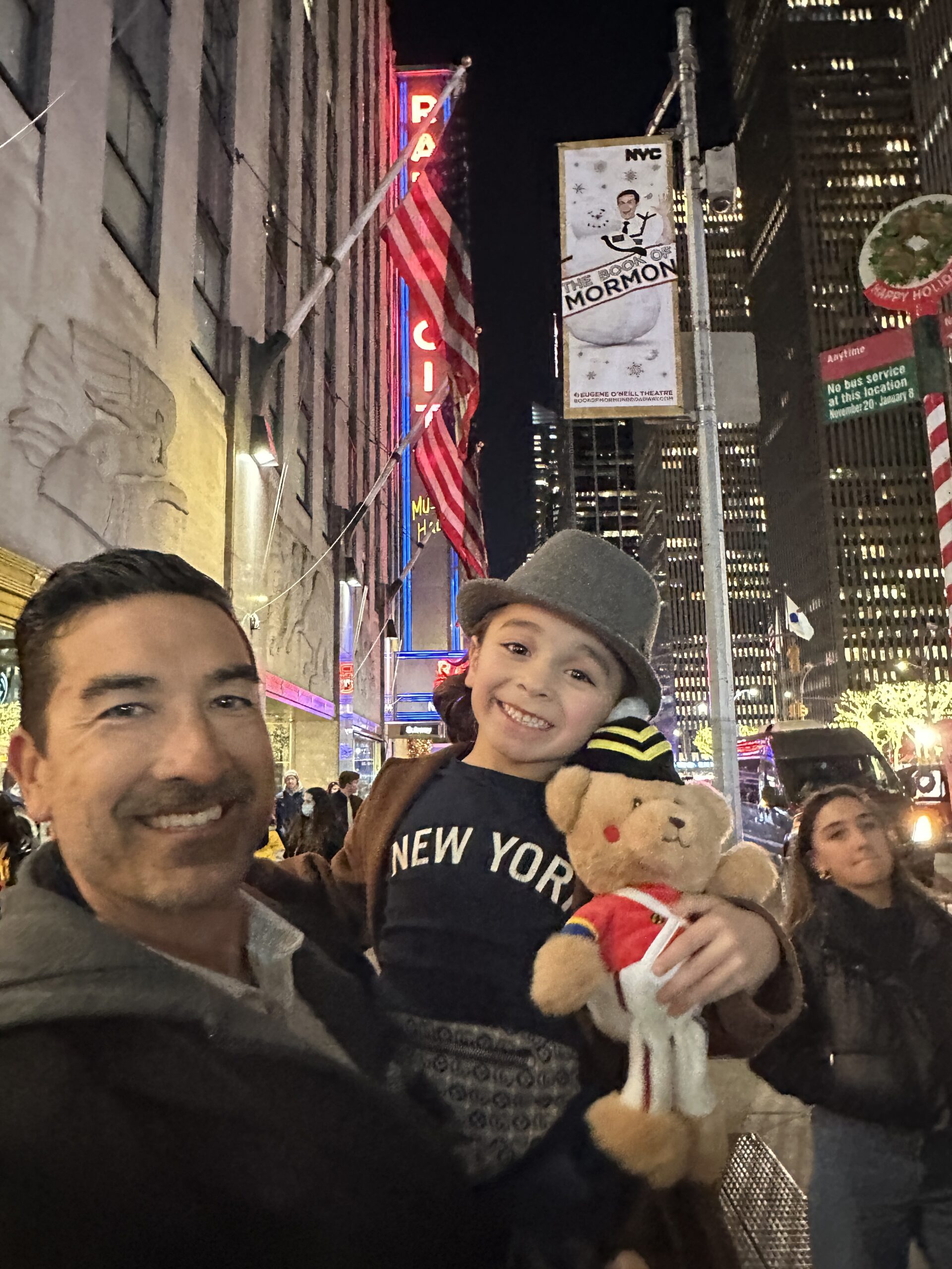 father and son on streets of new york