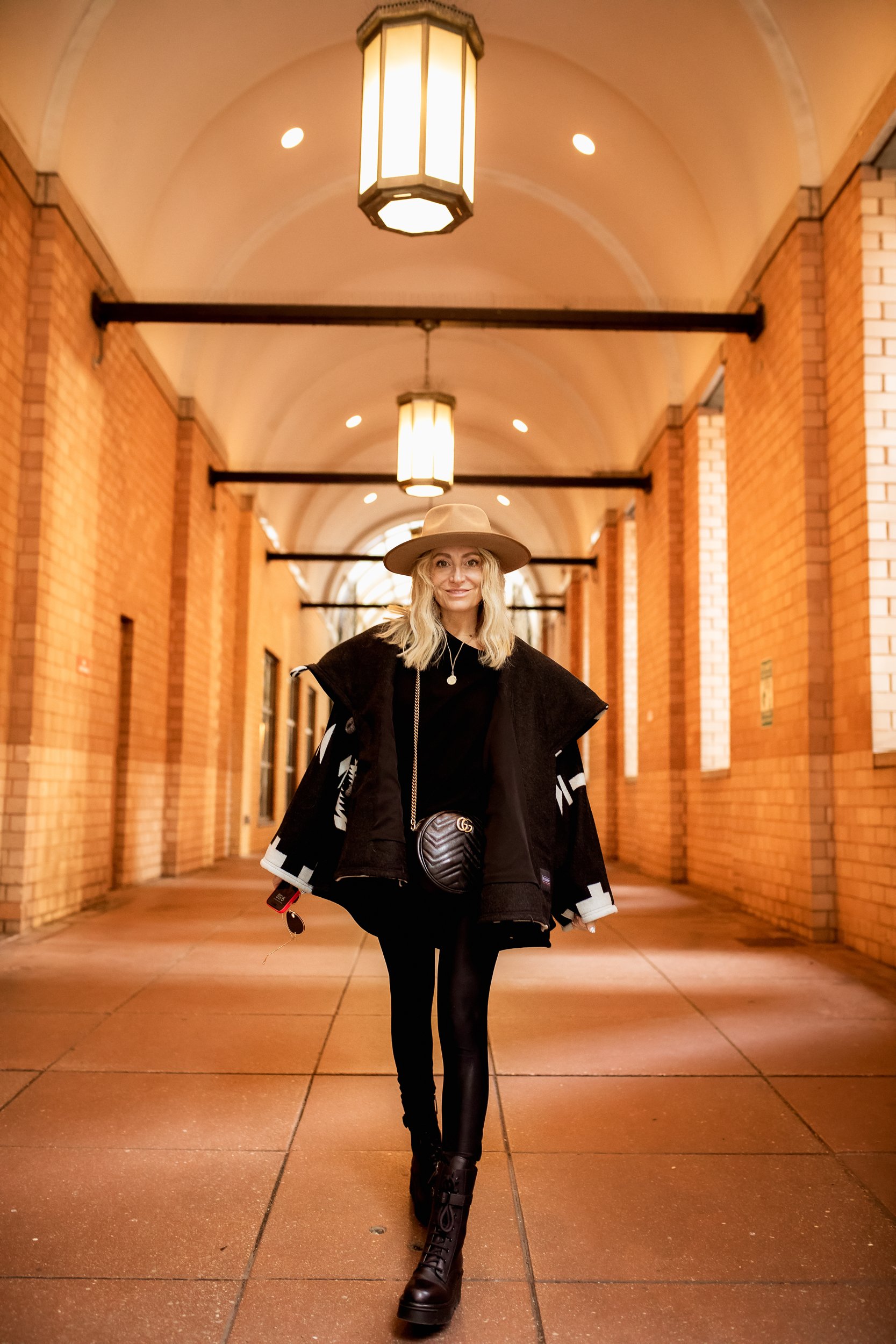 woman walking in hallway