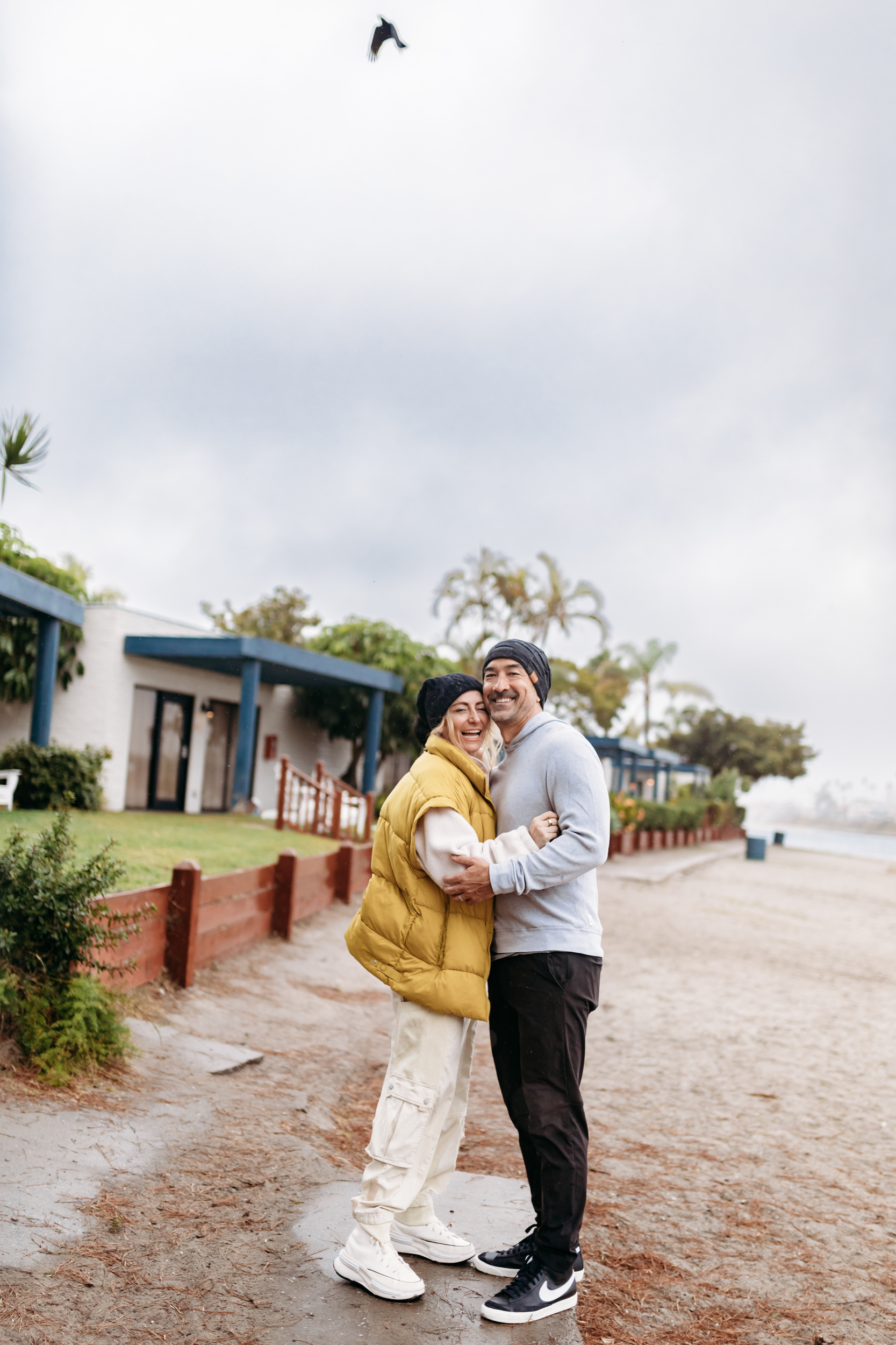 couple hugging on the beach