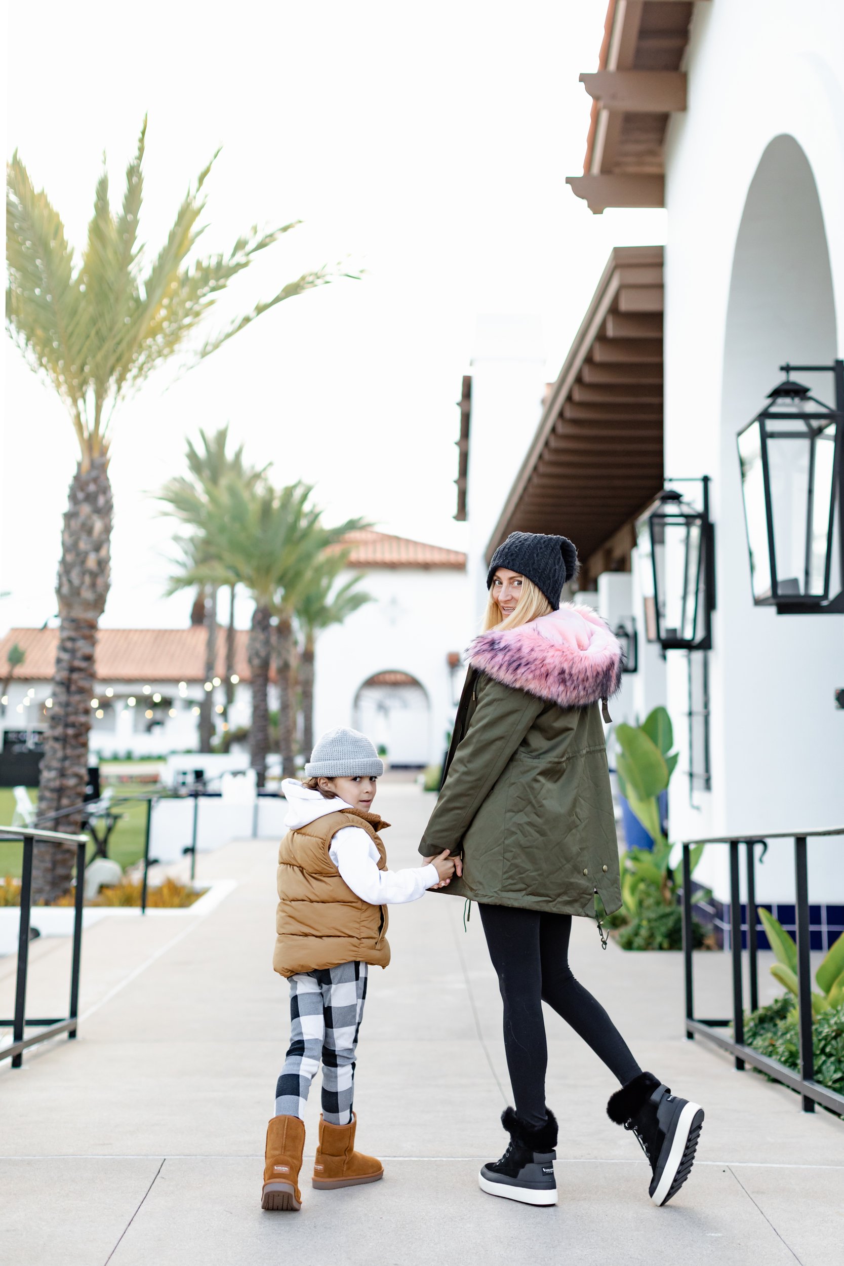 mom and son walking