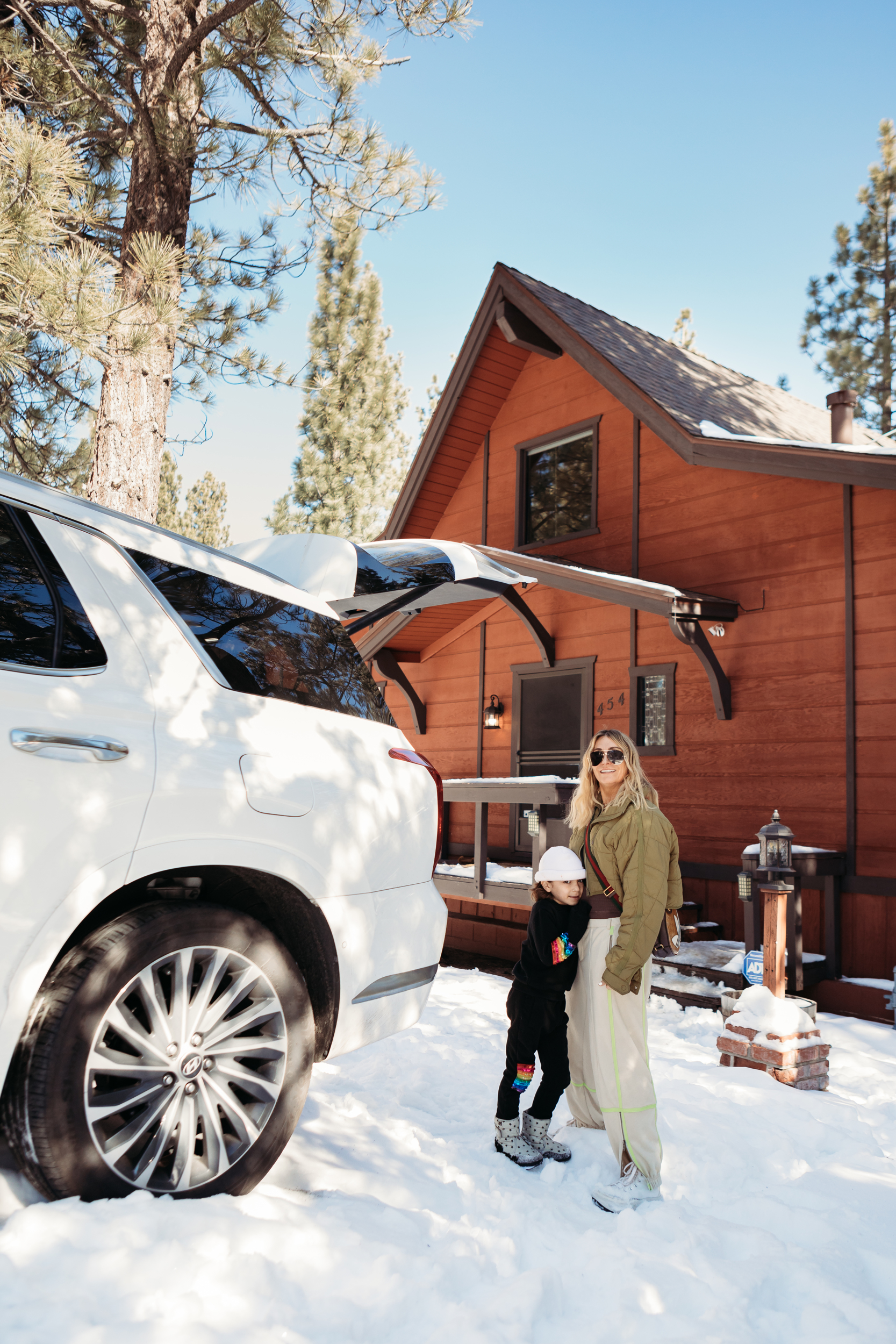 mom and son at winter cabin