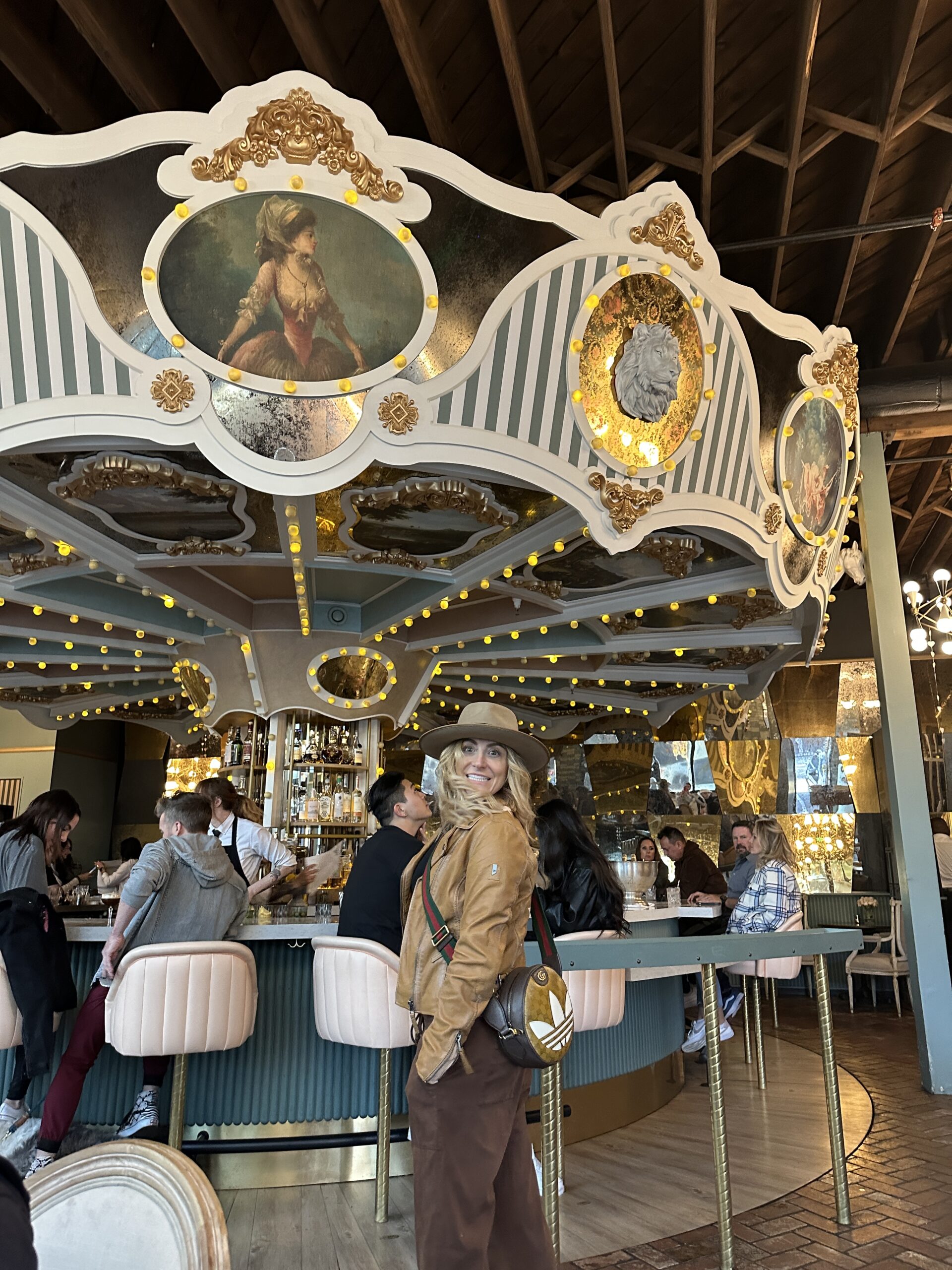 woman by a carousel bar