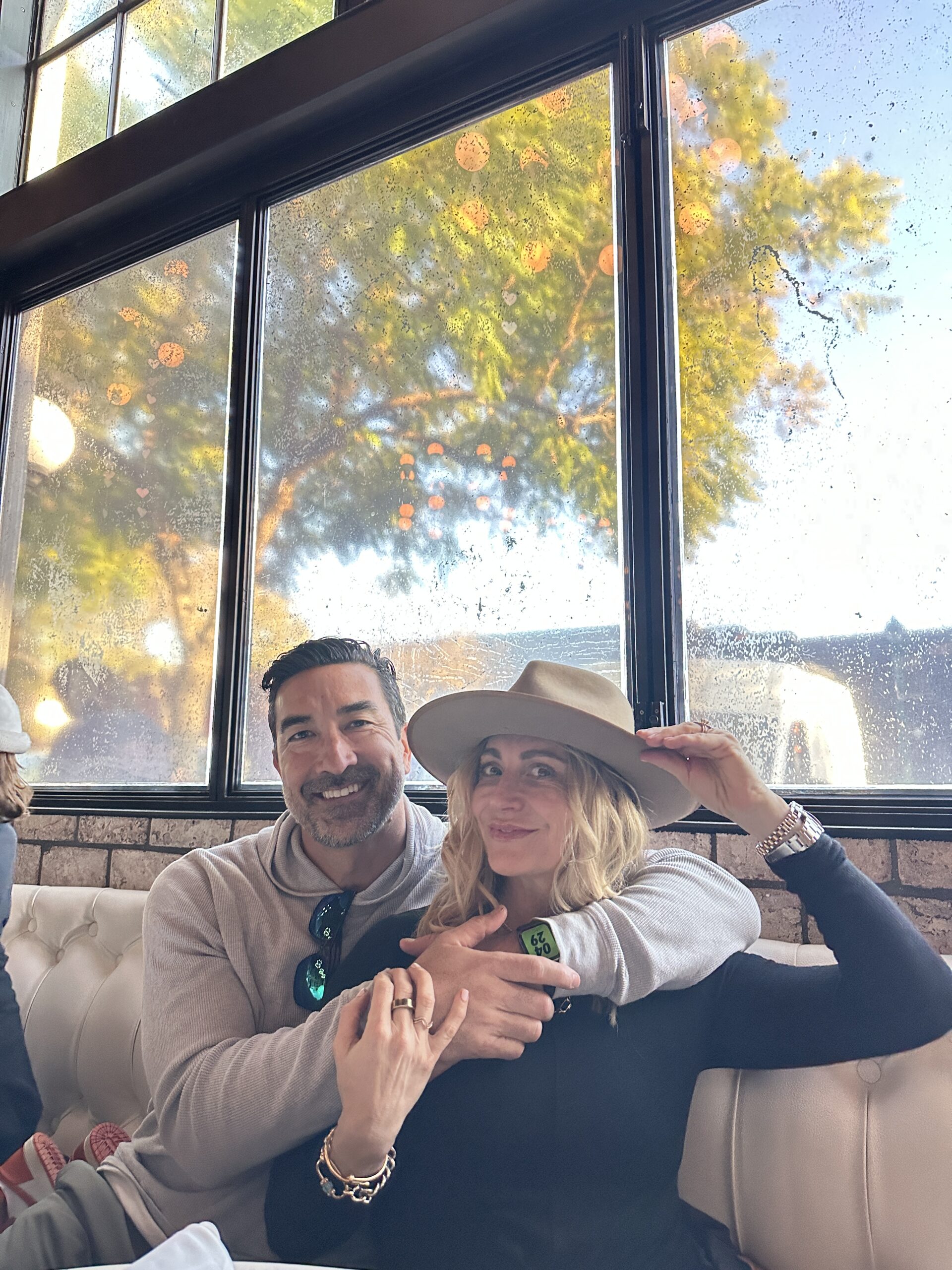 couple sitting in a restaurant booth