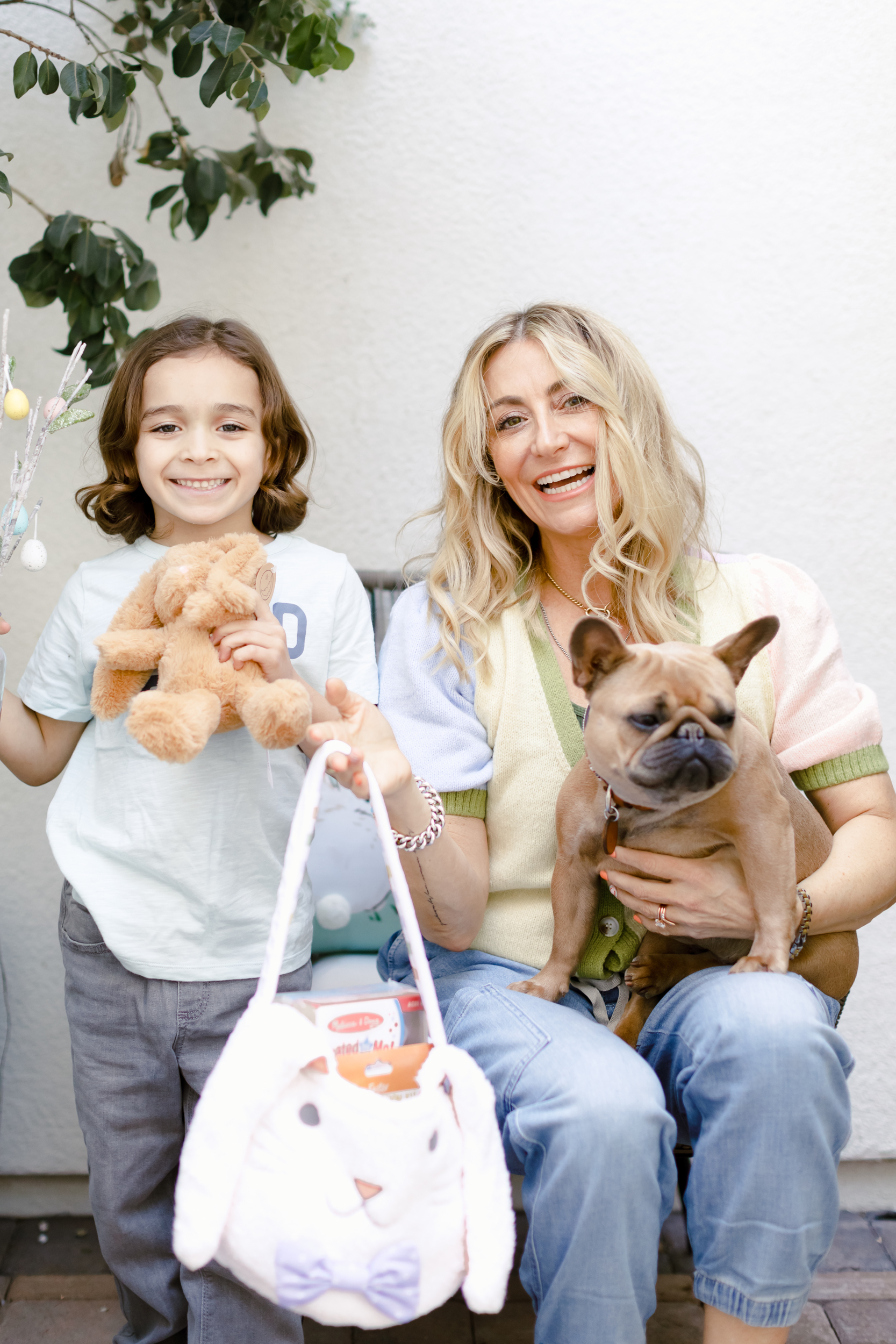 mom and son with dog