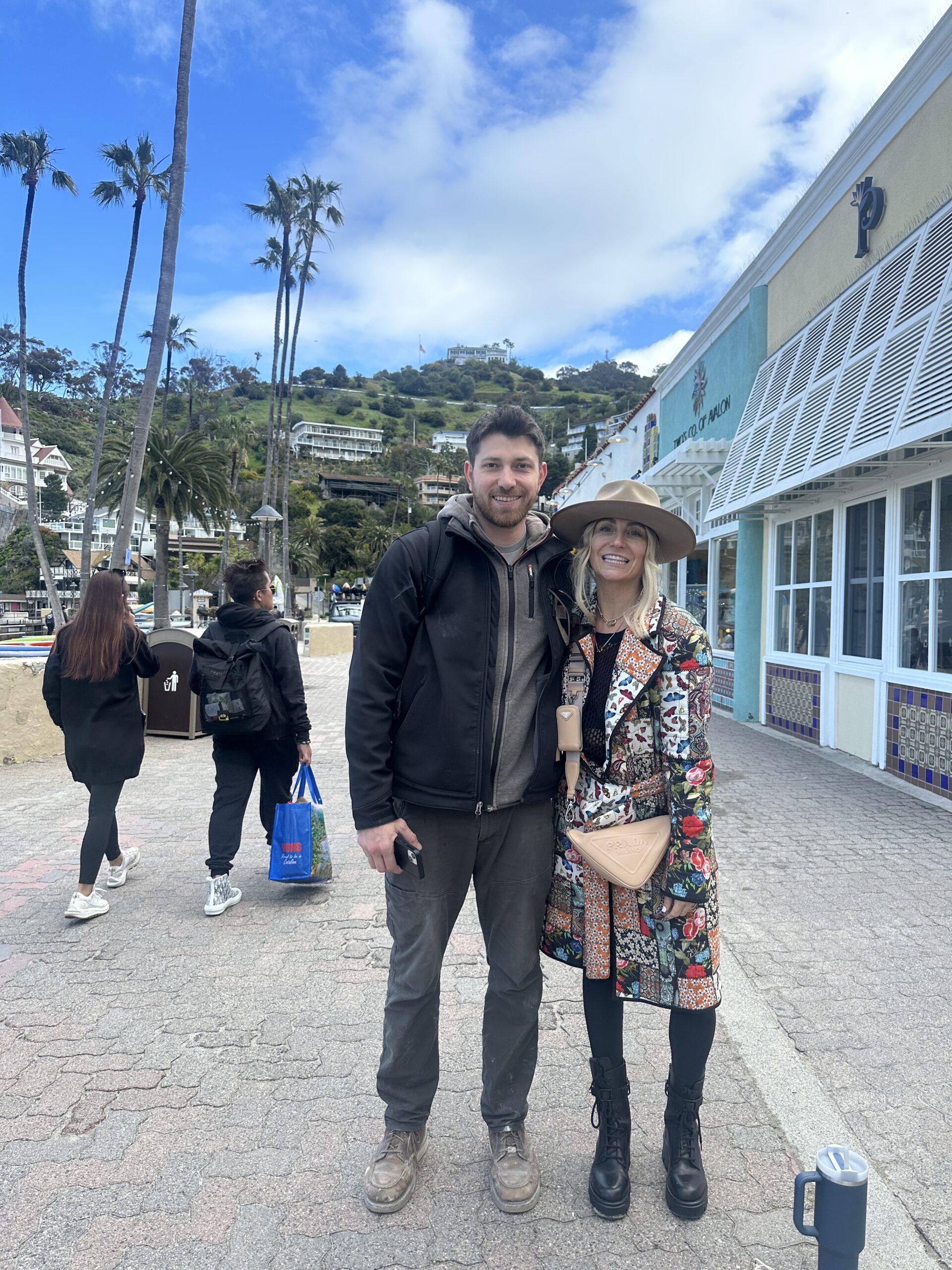 man and woman standing on pathway