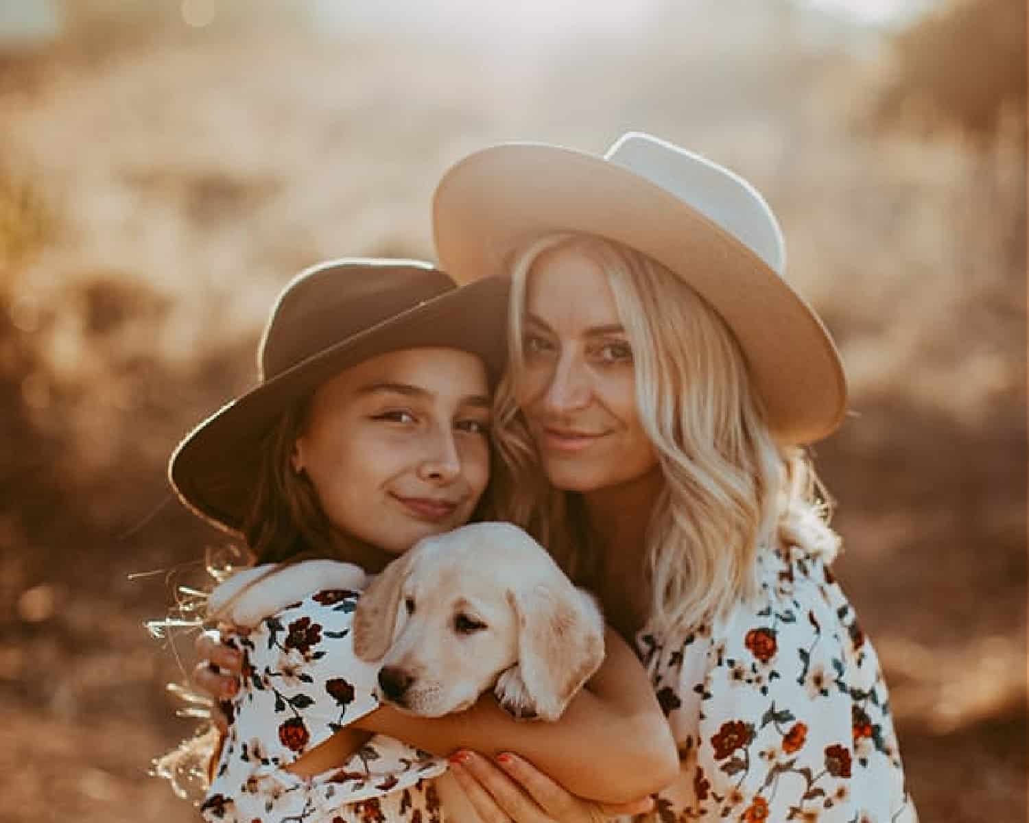 Cute Little Girl and Her Beautiful Mom in Matching Aprons and Caps