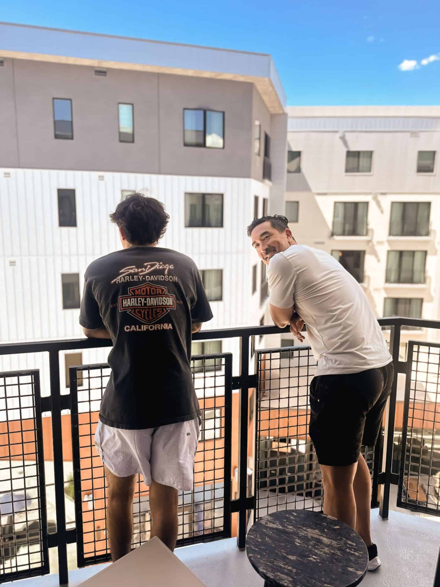 2 guys on a balcony