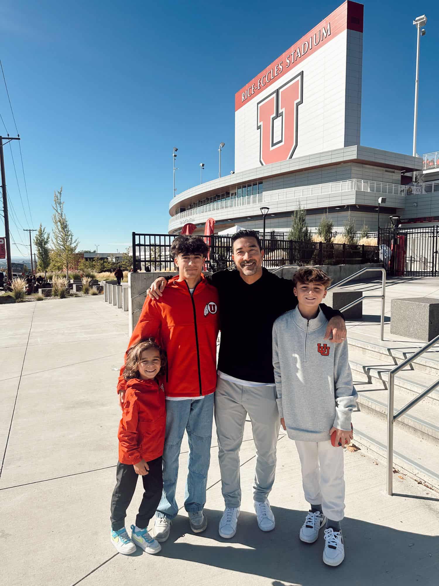 family outside of football game