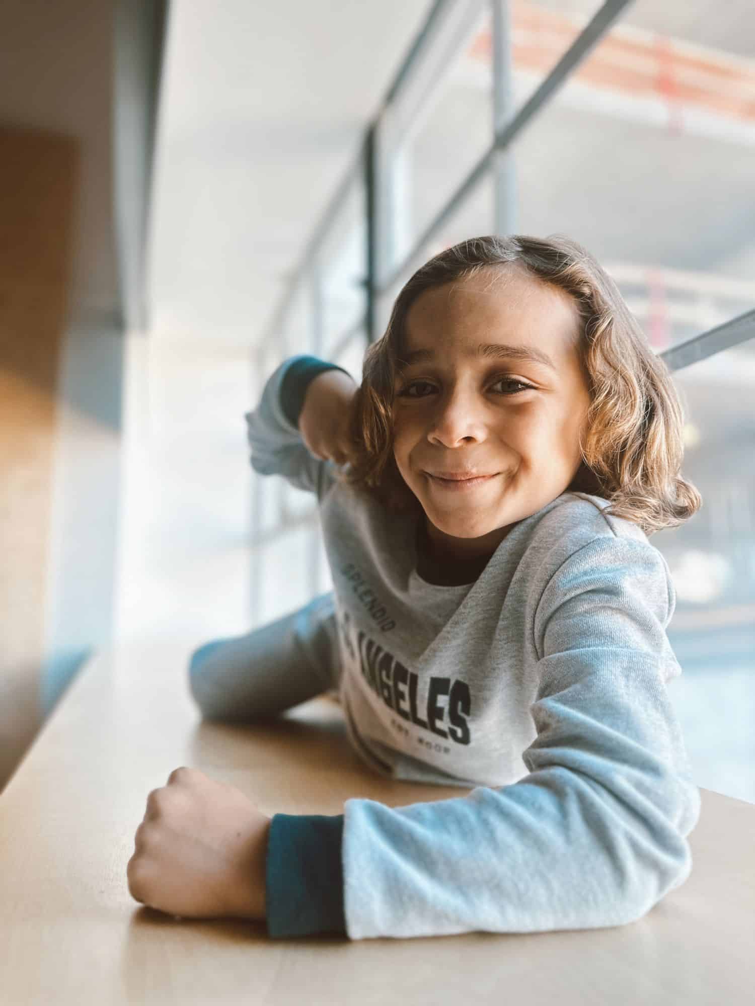 boy on window sill