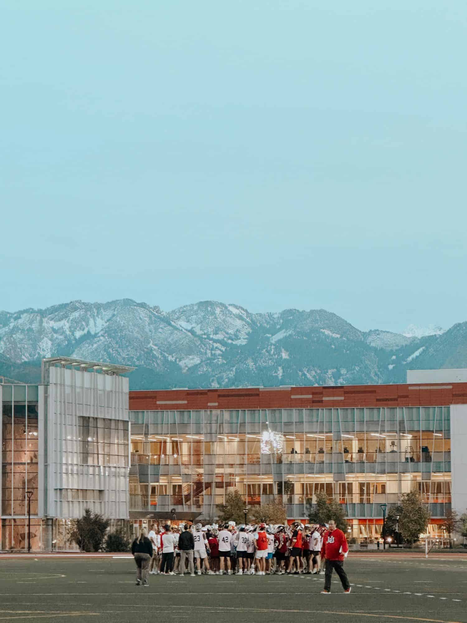 kids around a glass building