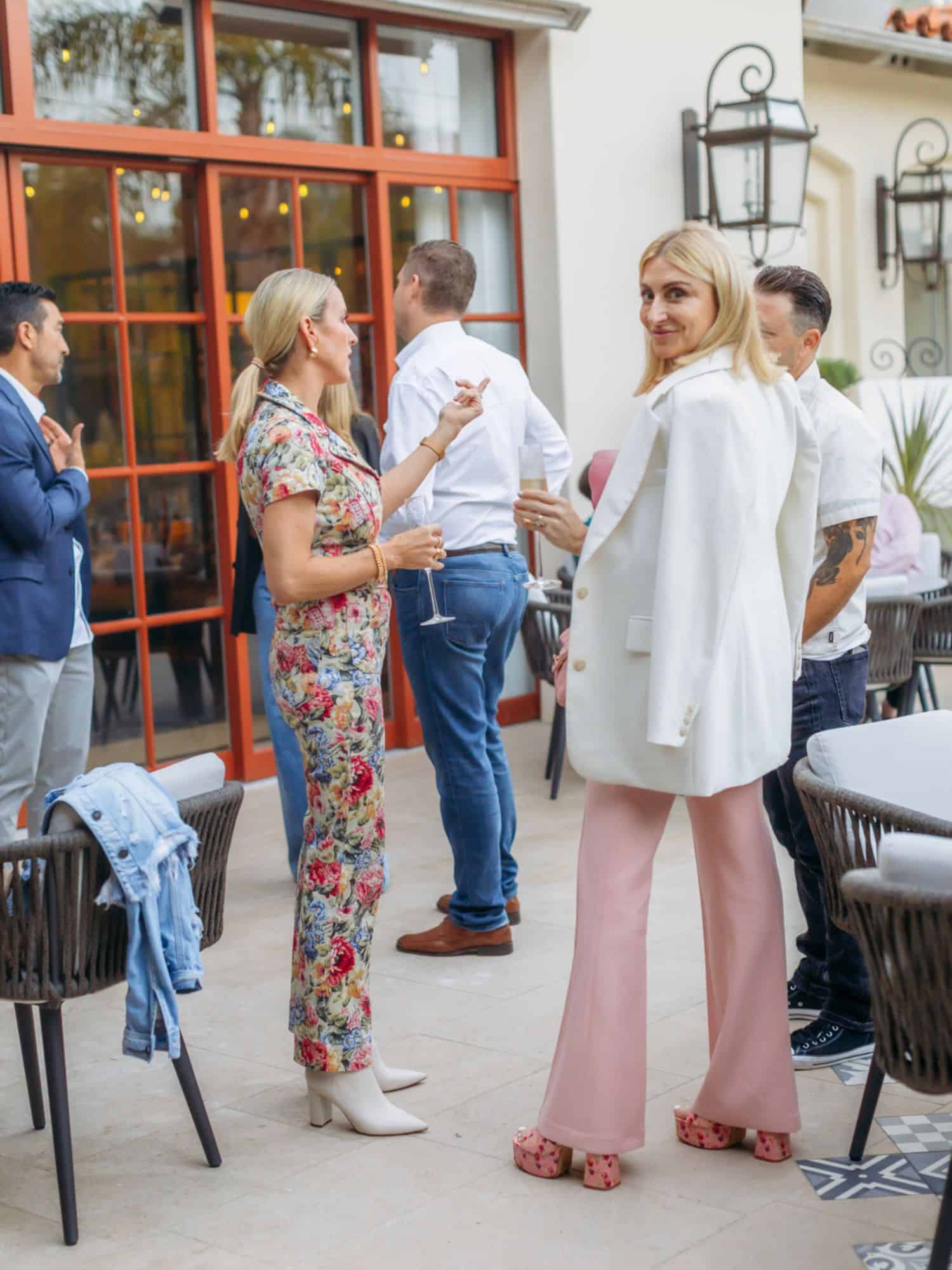 woman standing outside with friends