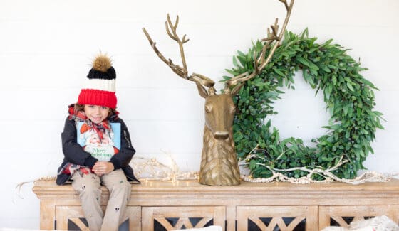 boy sitting in side table