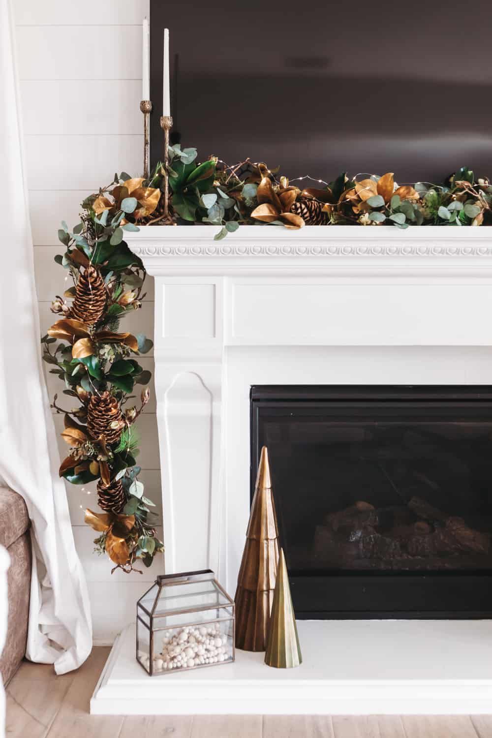 greenery hanging off the fire place